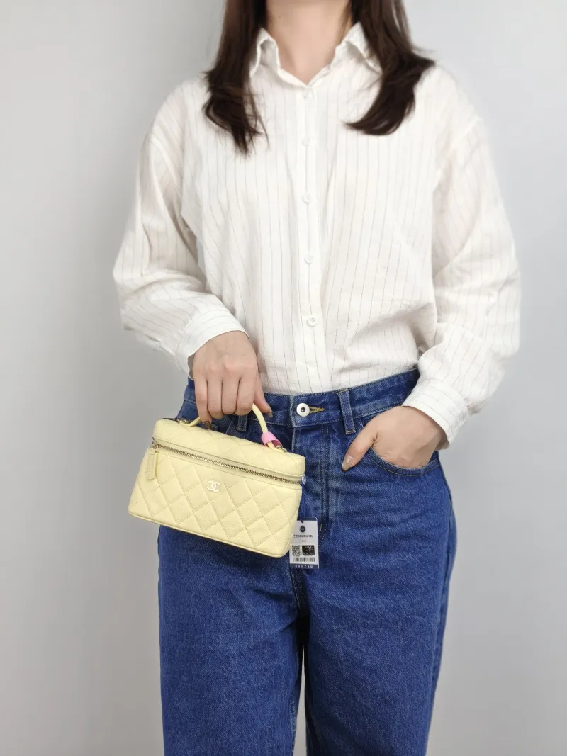 Chanel Crossbody Bag lp Box Bag Top Handle Crossbody Bag Yellow Grained Calfskin 19.5 × 5 × 12 cm — on-model view 2 of 3