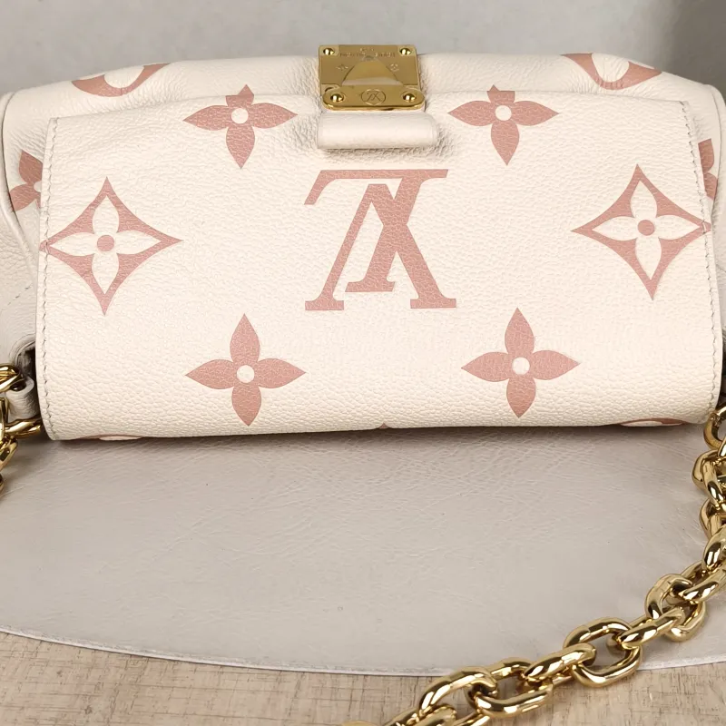 Louis Vuitton Crossbody Bag Favorite White · Pink Empreinte Embossed Calfskin Monogram Medium24 × 9 × 14 cm — detail view 5 of 14