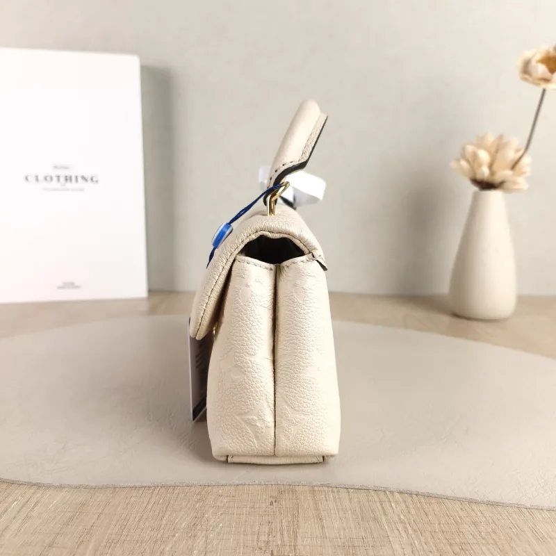 Louis Vuitton Crossbody Bag MADELEINE White Empreinte Embossed Calfskin nano 21 × 6 × 12.5 cm — detail view 4 of 11
