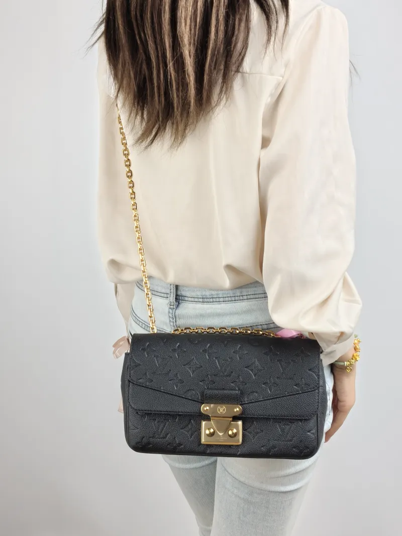 Louis Vuitton Crossbody Bag Marceau Chain Bag Black Monogram Empreinte Embossed Calfskin 24.5 × 6.5 × 15 cm — on-model view 1 of 2