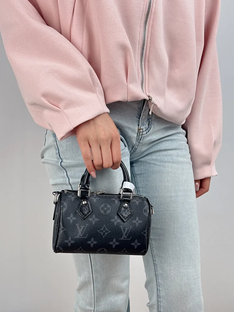 Louis Vuitton Crossbody Bag Speedy Nano Monogram PVC nano 16 × 7.5 × 10 cm — on-model view 2 of 2