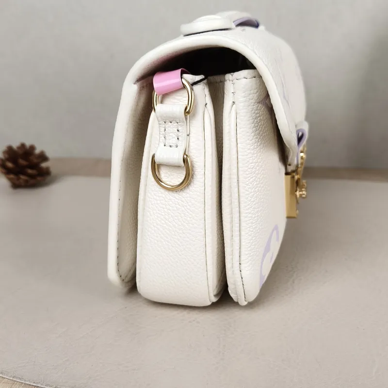 Louis Vuitton Crossbody Bag Pochette Métis East West White · Empreinte Embossed Calfskin Small 21.5 × 6 × 13.5 cm — detail view 10 of 14