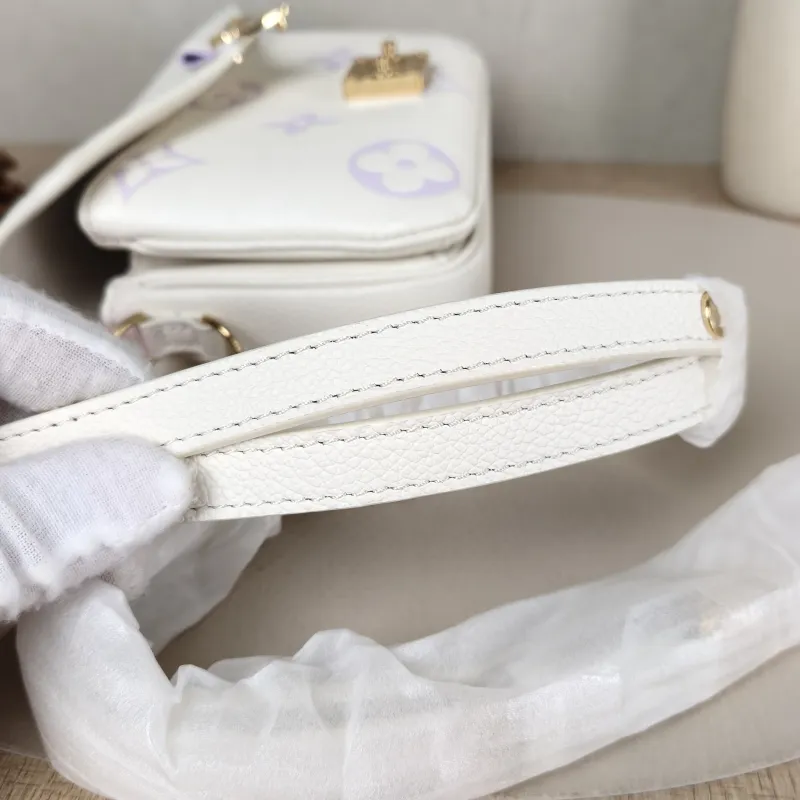 Louis Vuitton Crossbody Bag Pochette Métis East West White · Empreinte Embossed Calfskin Small 21.5 × 6 × 13.5 cm — detail view 13 of 14