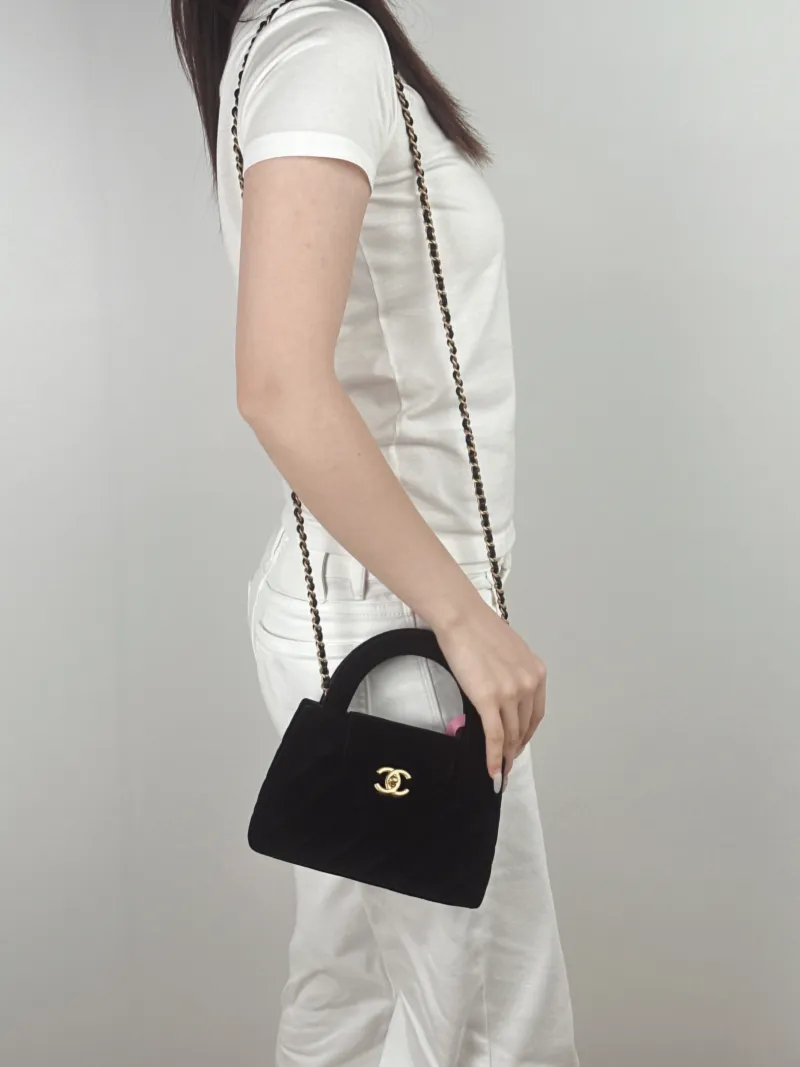 Chanel Crossbody Bag Kelly Black Velvetmini19 × 7 × 13 cm — on-model view 3 of 3