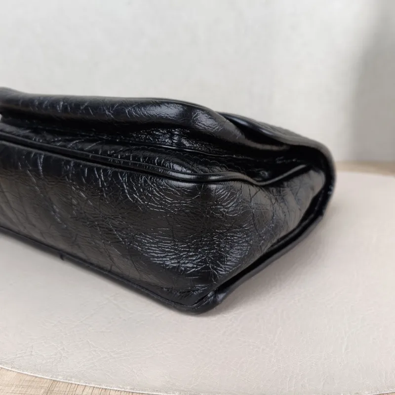 SAINT LAURENT Crossbody Bag Niki Black Waxed Leather Calfskin Small 21 × 7.5 × 16 cm — detail view 12 of 12