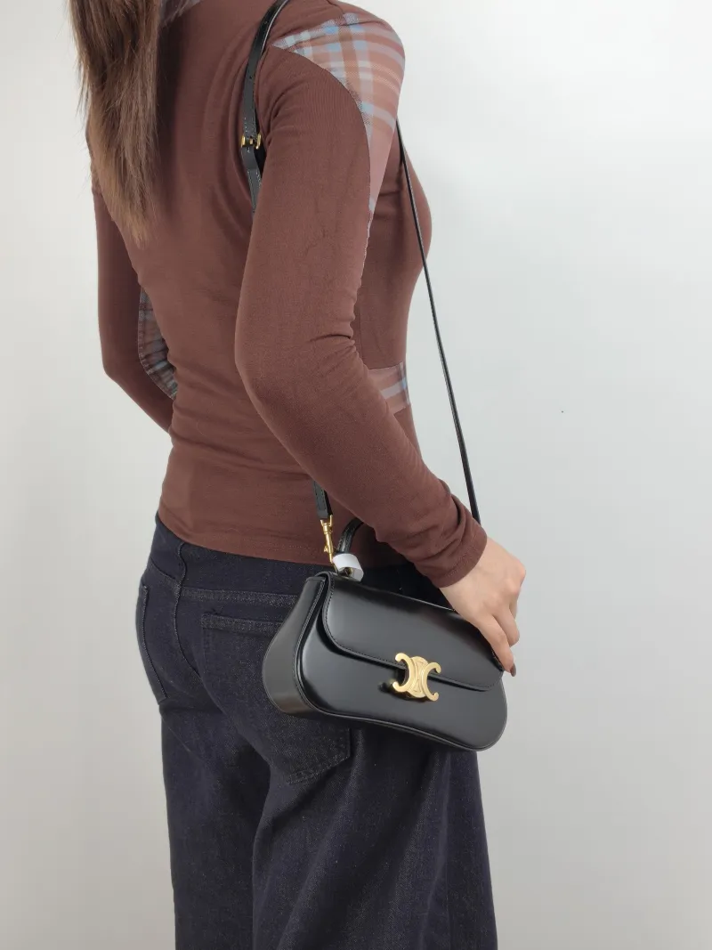 CELINE Crossbody Bag teen lola Crossbody Bag Black Calfskin One Size 20 × 5 × 11.5 cm — on-model view 1 of 3