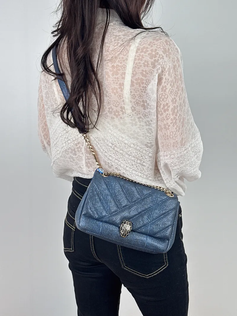Bvlgari Crossbody Bag Serpenti Cabochon Navy Small 21.5 × 7 × 15 cm — on-model view 1 of 2
