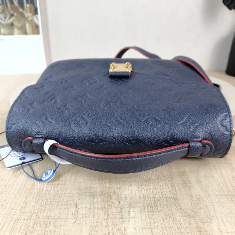 Louis Vuitton Crossbody Bag Pochette Métis · Monogram Empreinte Embossed Calfskin Medium 25 × 7 × 19 cm — detail view 12 of 13