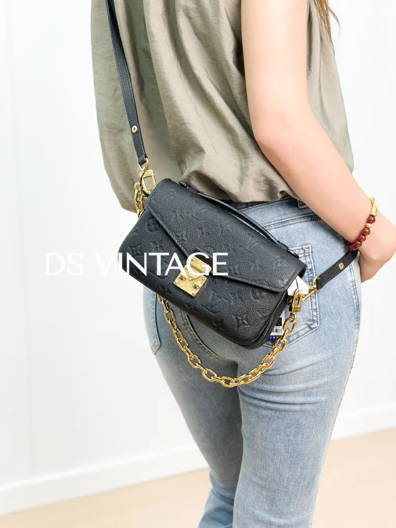 Louis Vuitton Crossbody Bag Pochette Métis East West Black Empreinte Embossed Calfskin Small 21.5 × 6 × 13.5 cm — on-model view 2 of 3