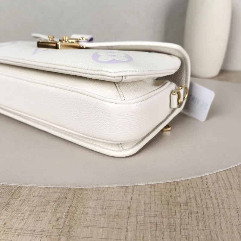 Louis Vuitton Crossbody Bag Pochette Métis East West White · Monogram Empreinte Embossed Calfskin Small 21.5 × 6 × 13.5 cm — detail view 8 of 15