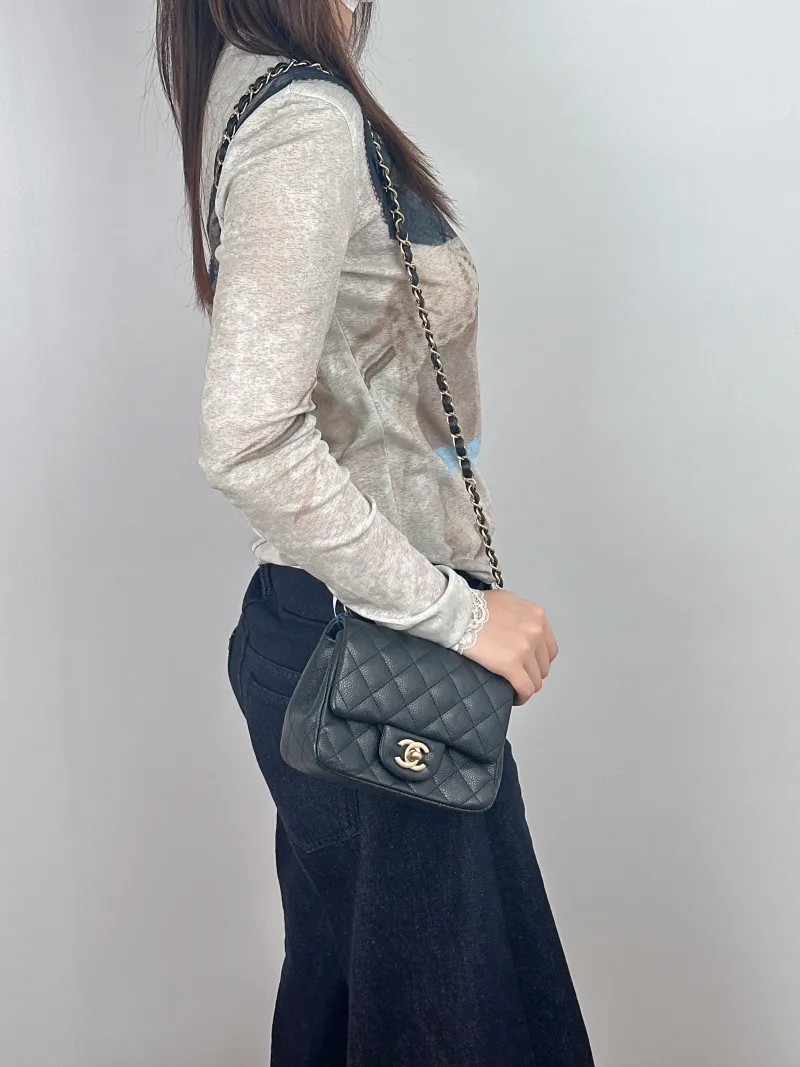 Chanel Crossbody Bag Classic Flap Mini CF Mini Black Grained Calfskin17 × 8 × 13.5 cm — on-model view 1 of 2