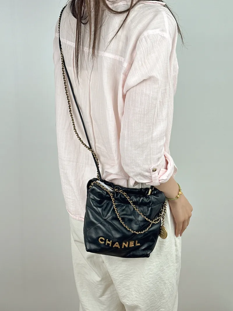 Chanel Shoulder Bag22Bag Black CC alfskinmini20 × 6 × 19 cm — on-model view 2 of 2