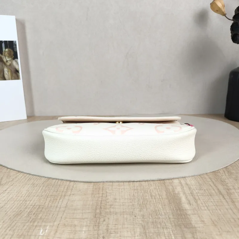 Louis Vuitton Crossbody Bag IVY White · Pink Monogram Empreinte Embossed Calfskin Small 23.5 × 4.3 × 12 cm — cover view 3 of 5