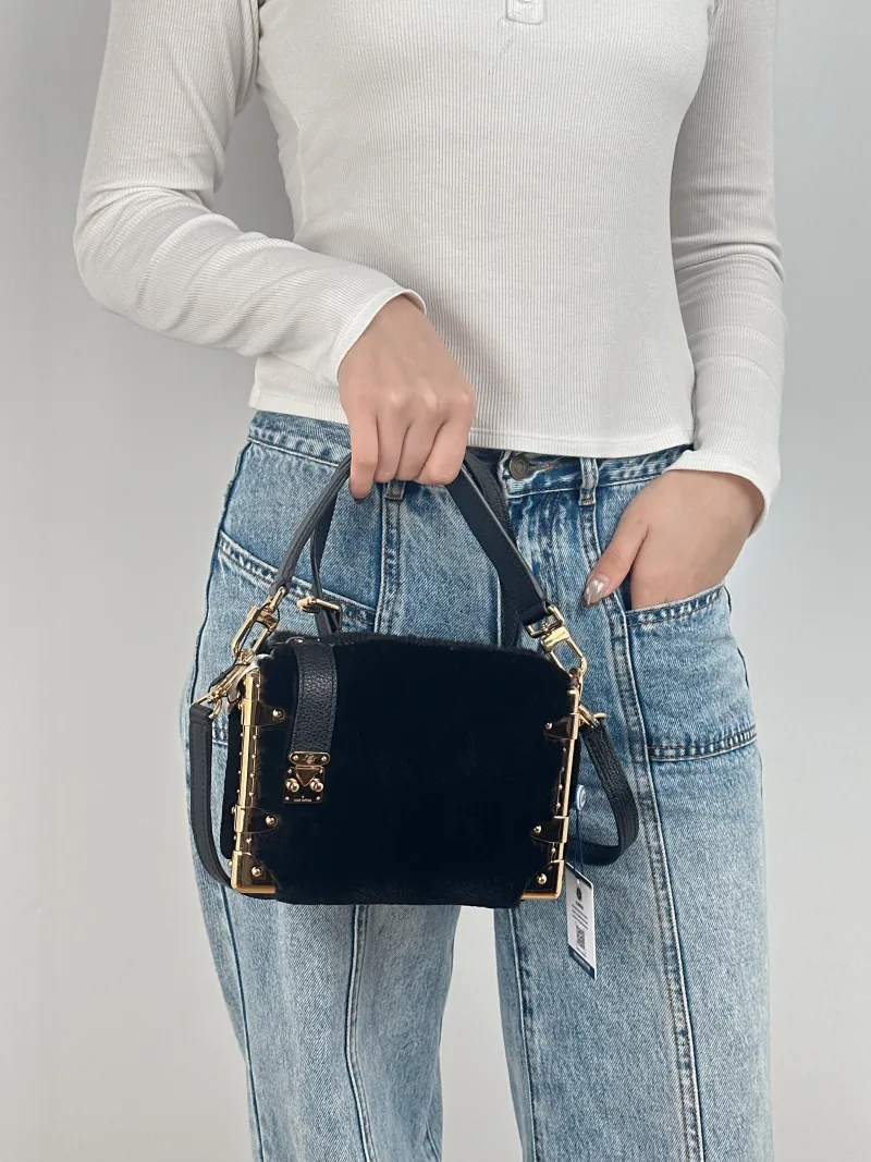 Louis Vuitton Crossbody Bag Side Trunk Box Black Small 19 × 7 × 12.5 cm — on-model view 1 of 3