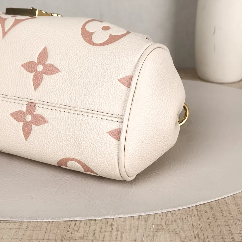 Louis Vuitton Crossbody Bag Favorite White · Pink Empreinte Embossed Calfskin Monogram Medium24 × 9 × 14 cm — detail view 7 of 14