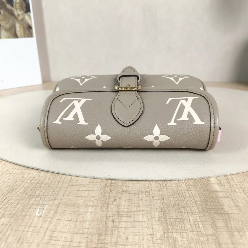 Louis Vuitton Crossbody Bag Diane Baguette Bag Empreinte Embossed Calfskin nano 19 × 6 × 10.5 cm — detail view 5 of 12