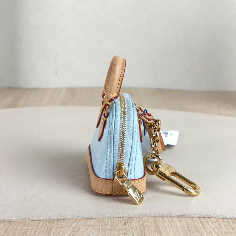 Louis Vuitton Key Ring alma Key Ring Blue Patent Leather One Size 8 × 3.5 × 6 cm — detail view 1 of 6
