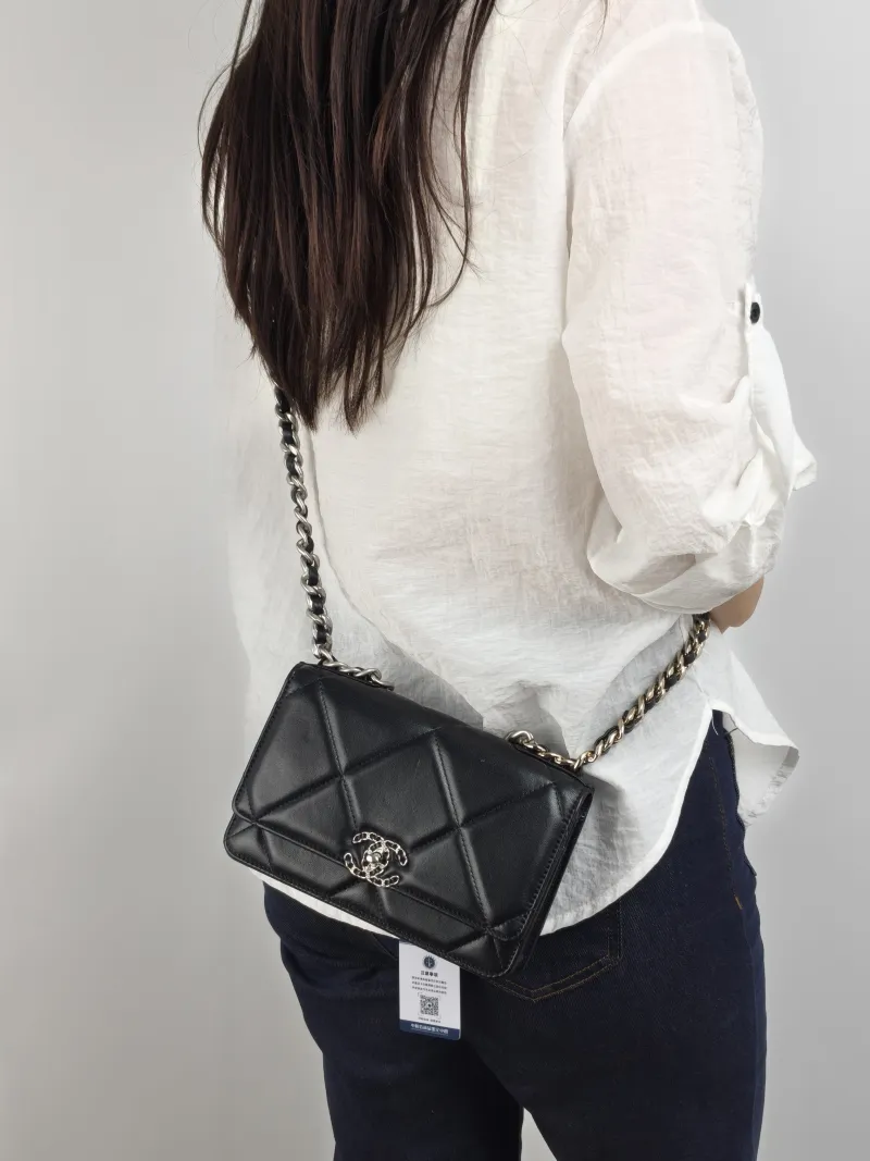 Chanel Crossbody Bag 19Bag WOC Black SL ambskin Mini 19.2 × 3.5 × 12.3 cm — on-model view 2 of 2