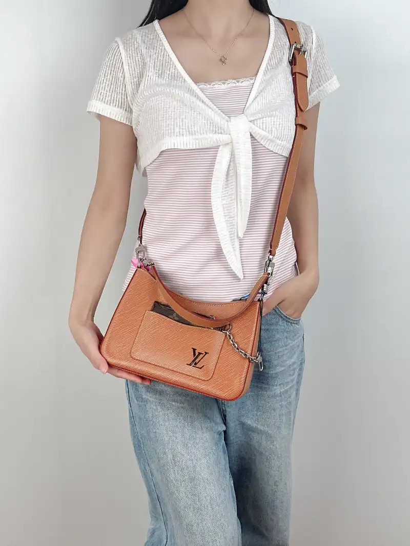 Louis Vuitton Crossbody Bag MARELLE Epi Embossed Calfskin Small 25 × 8 × 15 cm — on-model view 1 of 3