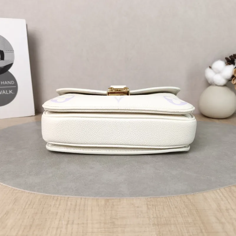 Louis Vuitton Crossbody Bag Pochette Métis East West White · Monogram Empreinte Embossed Calfskin Small 21.5 × 6 × 13.5 cm — cover view 3 of 6