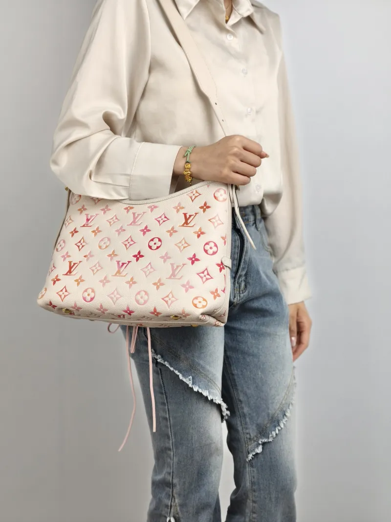 Louis Vuitton Crossbody Bag Carryall Calfskin Small 29.5 × 12 × 24 cm — on-model view 2 of 2