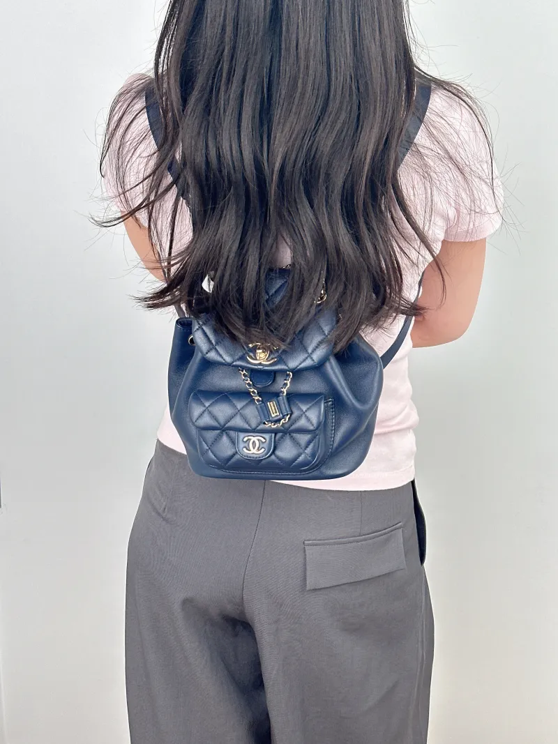 Chanel Backpack Duma Blue Lambskin Small18 × 12 × 18.5 cm — on-model view 1 of 2
