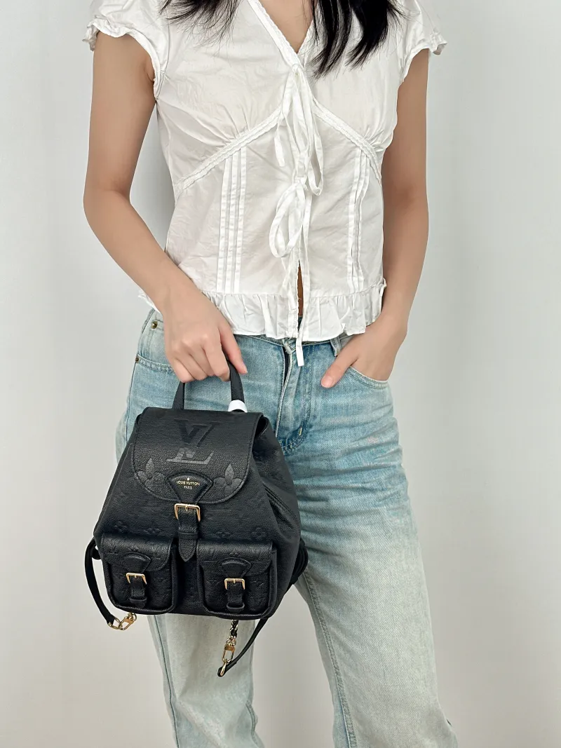 Louis Vuitton Backpack Backup Backpack Black Calfskin One Size20 × 14 × 22 cm — on-model view 2 of 3