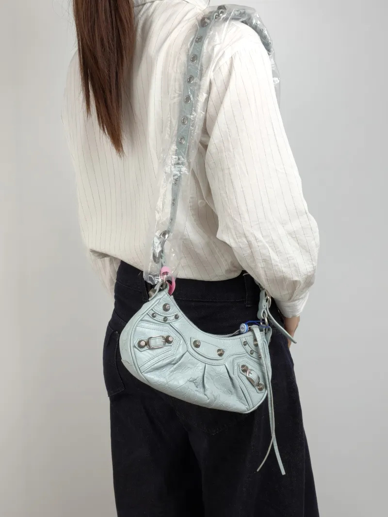 BALENCIAGA Crossbody Bag LE CAGOLE Lambskin XS 26 × 7 × 16 cm — on-model view 2 of 2