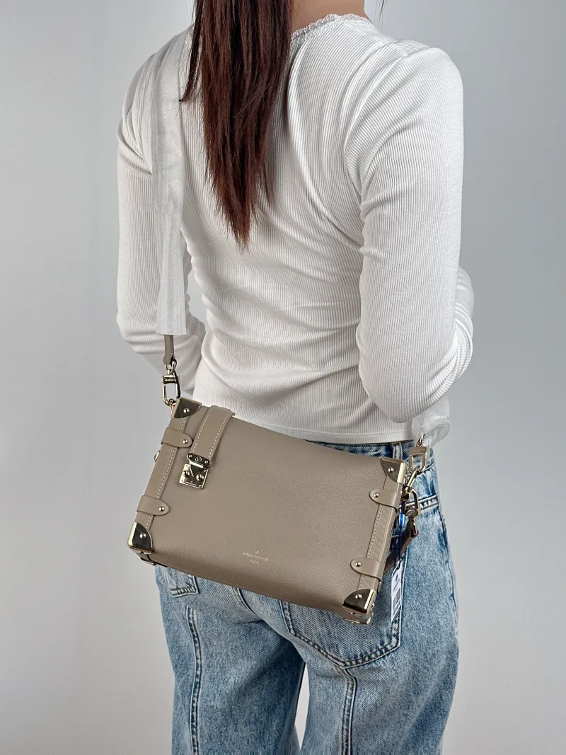 Louis Vuitton Crossbody Bag Side Trunk Box Calfskin Medium 23.5 × 8.5 × 16 cm — on-model view 2 of 3