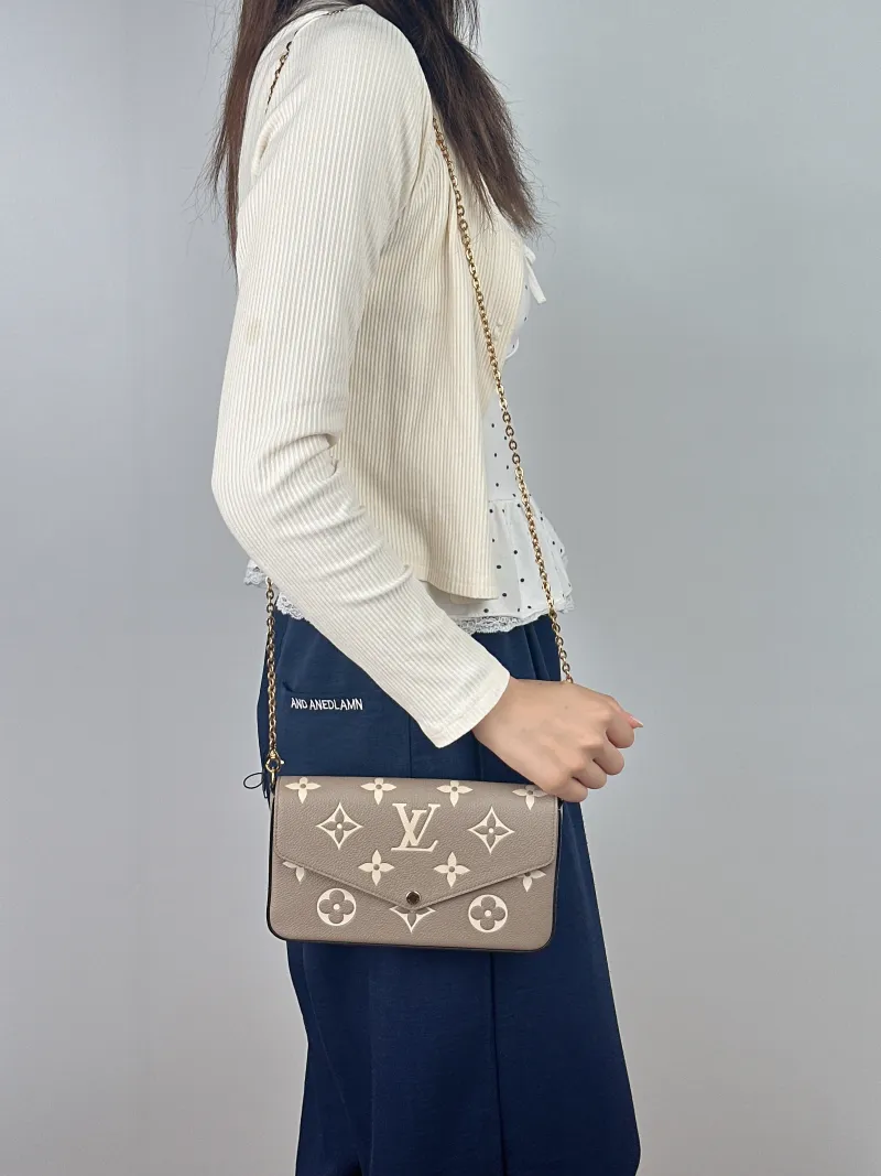 Louis Vuitton Crossbody Bag Pochette Félicie · White Calfskin Small 21 × 3 × 12 cm — on-model view 1 of 2
