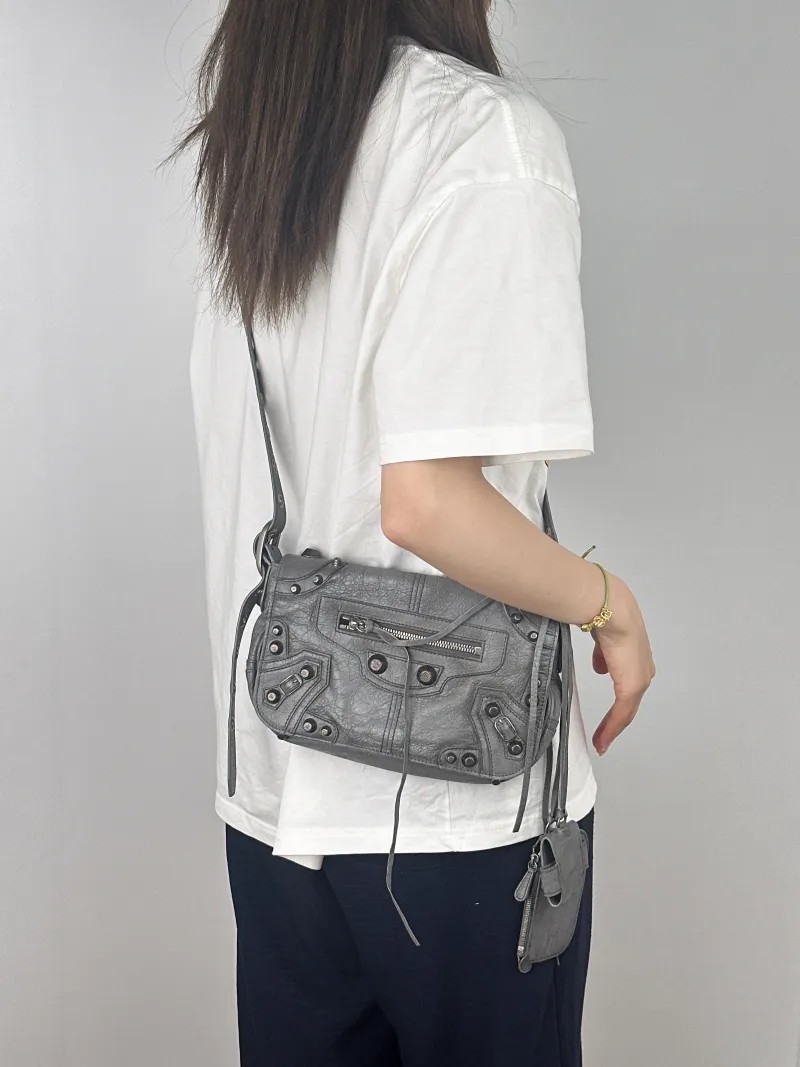BALENCIAGA Crossbody Bagle cagole Crossbody Bag Grey Lambskin One Size24 × 5 × 14 cm — on-model view 1 of 2