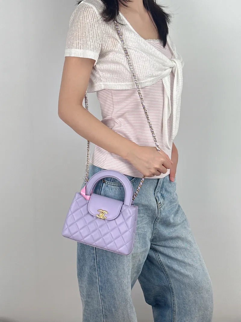 Chanel Crossbody Bag Kelly Lambskin mini19 × 7 × 13 cm — on-model view 3 of 3