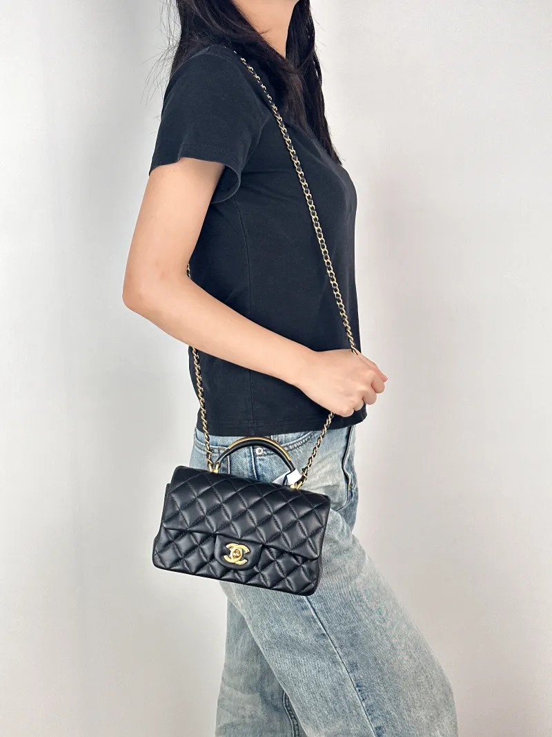 Chanel Crossbody Bag mini Black Lambskin mini20 × 6 × 12 cm — on-model view 2 of 3