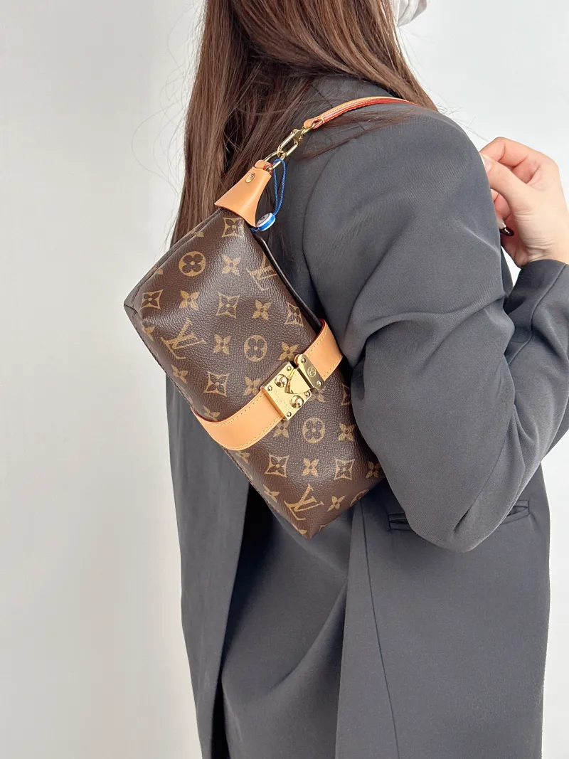 Louis Vuitton Shoulder Bag Pochette Mia Monogram PVC One Size 22 × 8 × 14.5 cm — on-model view 1 of 2