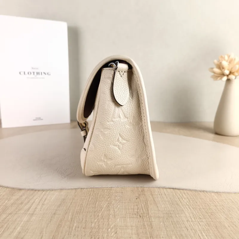 Louis Vuitton Crossbody Bag Diane Baguette Bag White Monogram Empreinte Embossed Calfskin Small 24 × 9 × 15 cm — detail view 1 of 12