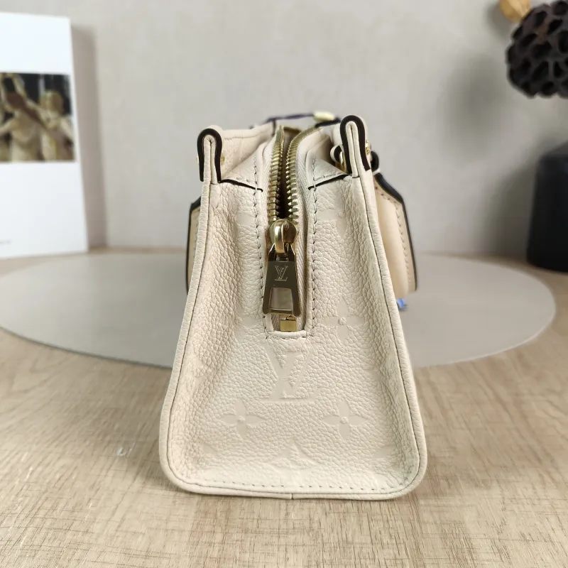 Louis Vuitton Crossbody Bag Onthego East West Two Straps White Empreinte Embossed Calfskin Small 25 × 10 × 13 cm — detail view 3 of 13