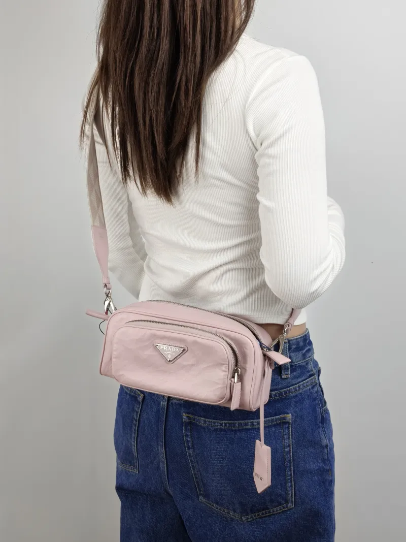 PRADA Crossbody Bag Camera Bag Pink Lambskin One Size 23 × 7 × 10 cm — on-model view 2 of 2