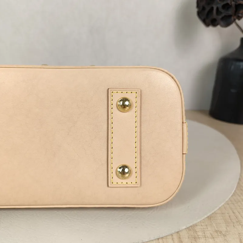 Louis Vuitton Crossbody Bag Alma BB Multicolore PVC BB 23.5 × 11.5 × 17.5 cm — detail view 7 of 11