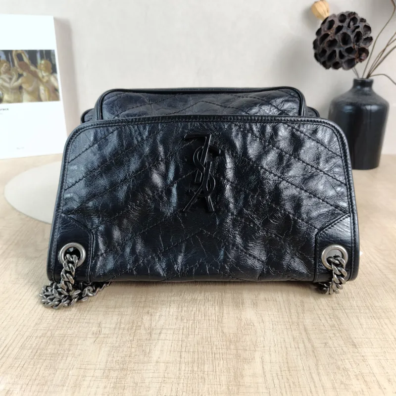 SAINT LAURENT Crossbody Bag Niki Black Waxed Leather Calfskin Medium 28 × 8.5 × 20 cm — detail view 1 of 13