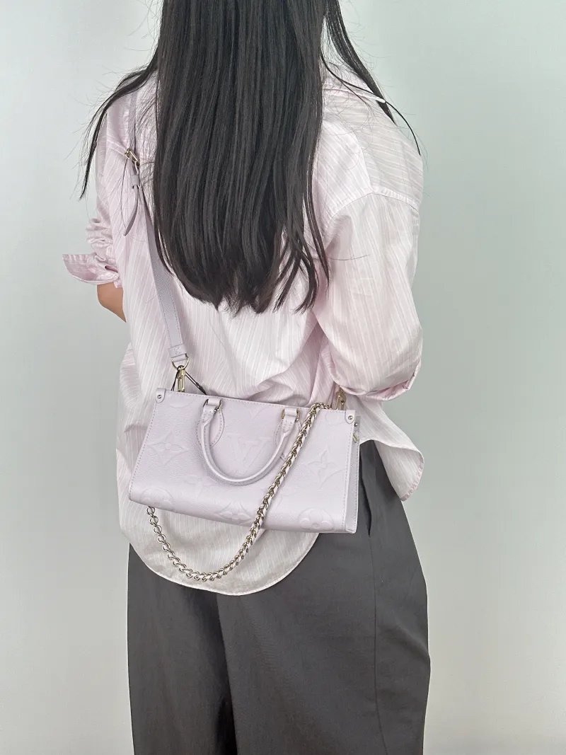 Louis Vuitton Crossbody Bag Onthego East West Two Straps Empreinte Embossed Calfskin Small 25 × 10 × 13 cm — on-model view 2 of 2