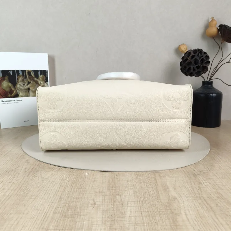 Louis Vuitton Shoulder Bag Onthego Medium White Empreinte Embossed Calfskin Medium 35 × 14 × 27 cm — cover view 3 of 5