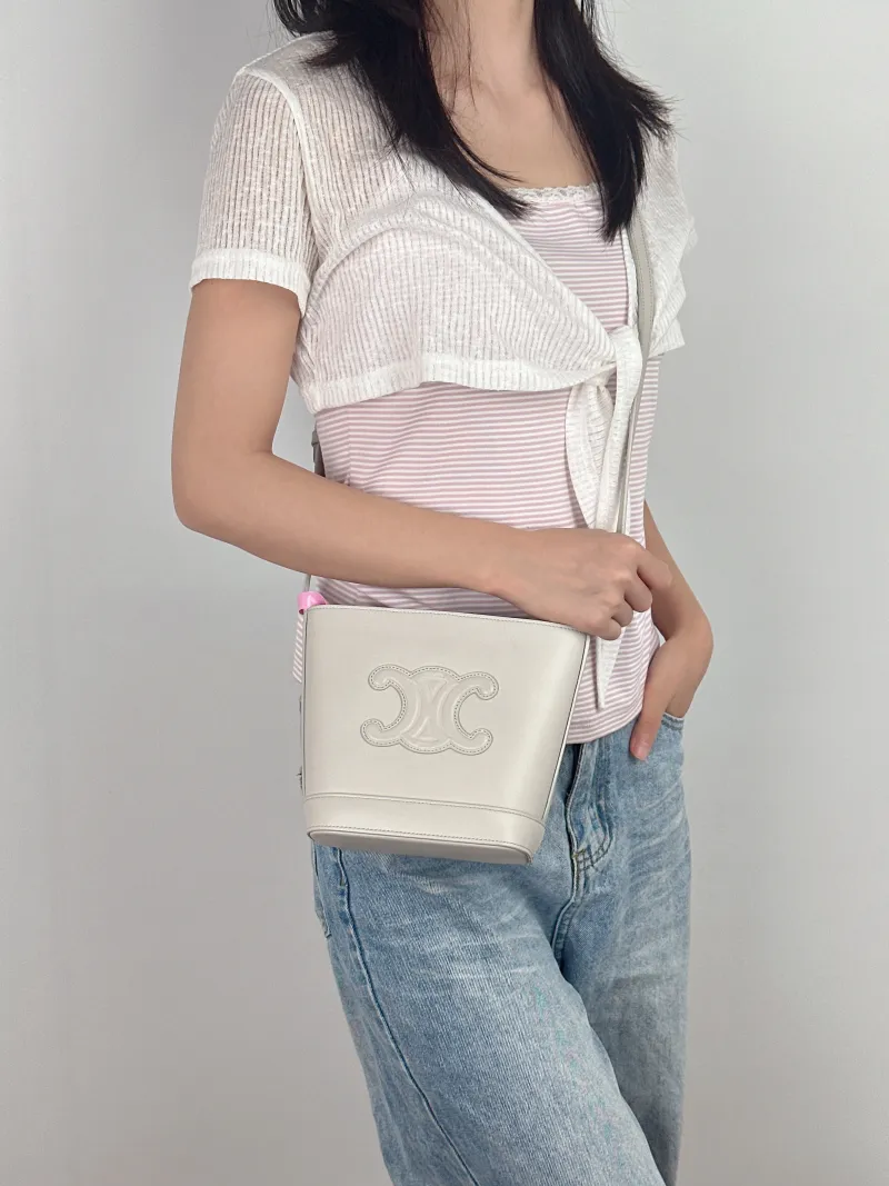 CELINE Shoulder Bag BUCKET TRIOMPHE Bucket Bag White Calfskinmini16 × 7 × 19.5 cm — on-model view 1 of 2