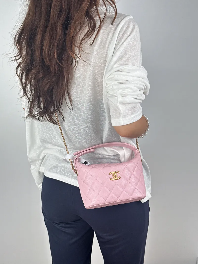 Chanel Crossbody Bag Gold-Tone Hardware Pink Grained Calfskin One Size21.5 × 7.5 × 19 cm — on-model view 1 of 2