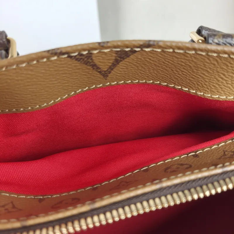 Louis Vuitton Crossbody Bag Onthego East West Two Straps Monogram PVC Small 25 × 10 × 13 cm — detail view 8 of 10