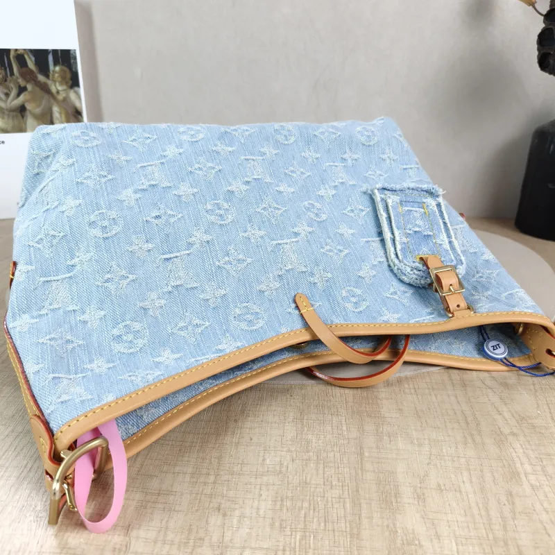 Louis Vuitton Crossbody Bag Carryall Blue Small 29 × 12 × 24 cm — detail view 1 of 14