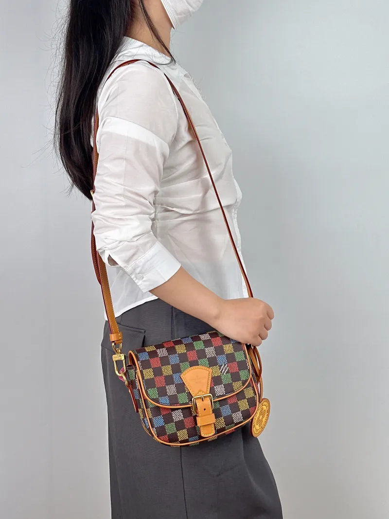Louis Vuitton Crossbody Bag MONTSOURIS Messenger Bag Brown PVC Small 20 × 7 × 17 cm — on-model view 1 of 2