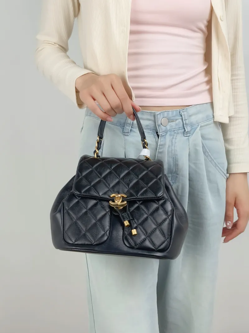 Chanel Crossbody Bag23k Backpack Black Lambskin 23 × 12 × 20 cm — on-model view 1 of 3