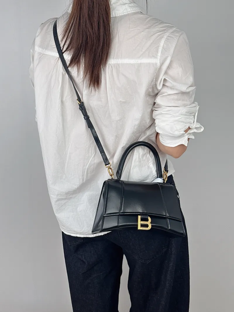 BALENCIAGA Crossbody Bag Hourglass Hourglass Bag Black Calfskin S 23 × 10 × 14 cm — on-model view 2 of 3