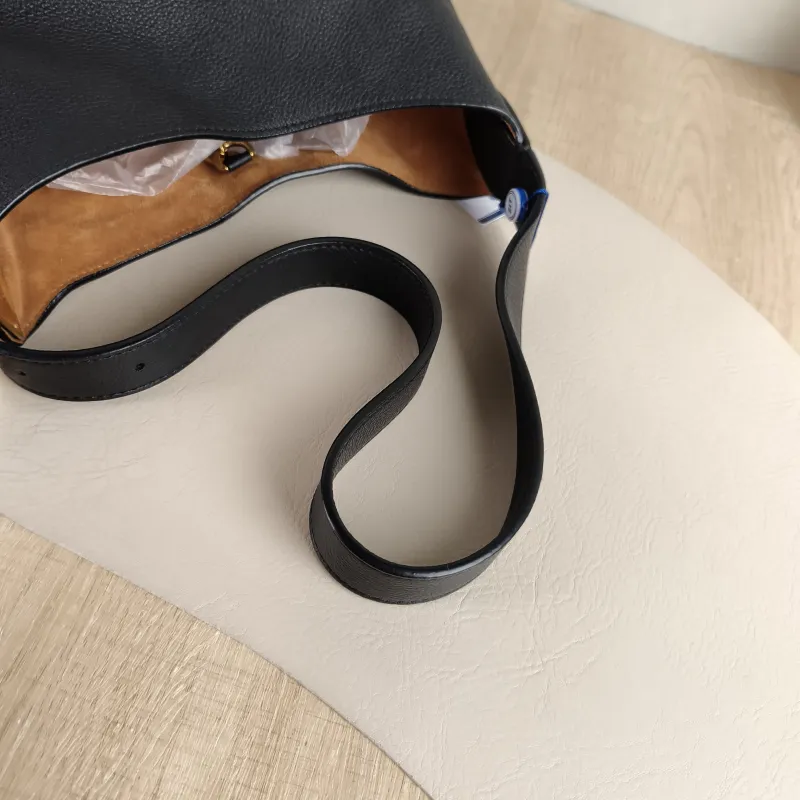 Louis Vuitton Shoulder Bag Low Key Hobo Shoulder Bag Black Calfskin Small 24 × 16 × 28 cm — detail view 1 of 11