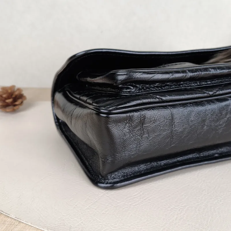 SAINT LAURENT Crossbody Bag Niki D Waxed Leather Calfskin Small21 × 7.5 × 16 cm — detail view 1 of 14